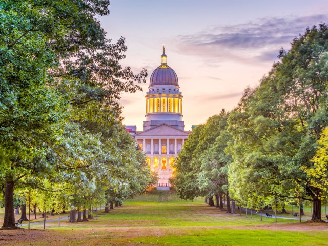 View of New Hampshire capitol building across park