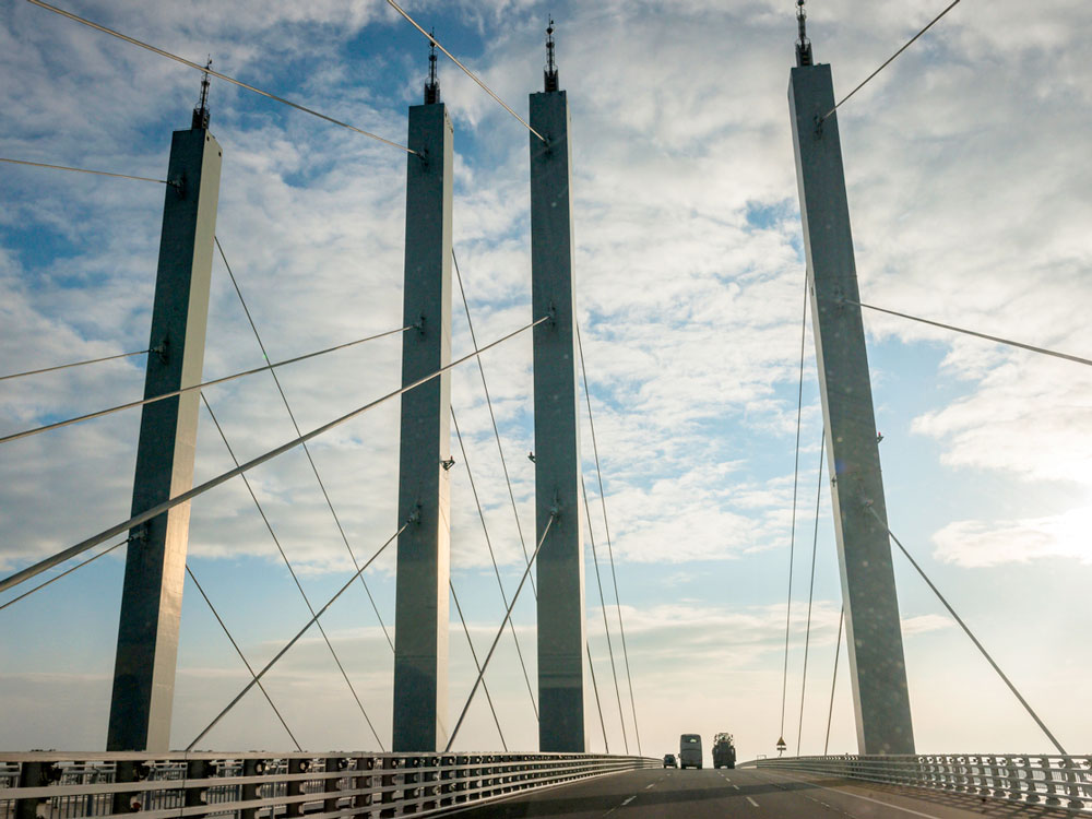 Looking up from roadway at supporting pillars of Jiaozhou Bay Bridge in China
