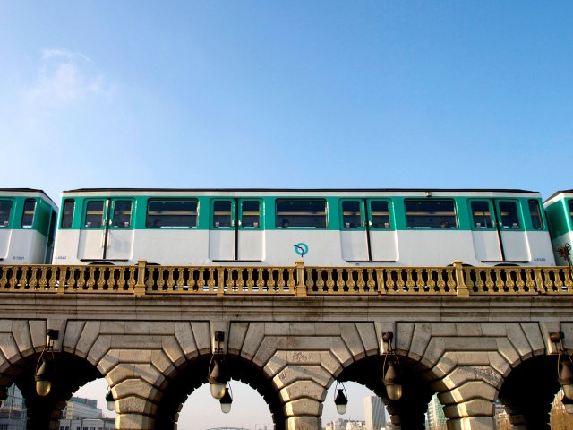 View up at Paris metro train on bridge