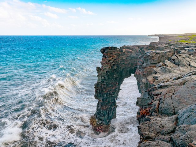 Arch over Pacific Ocean in Hawai'i Volcanoes National Park