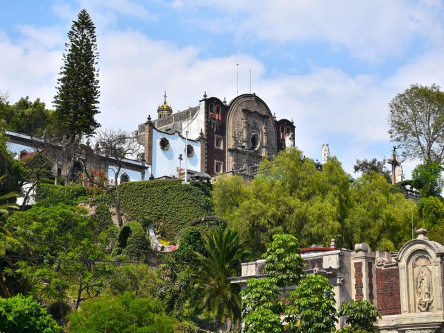 Ivy-covered walls and church on hilltop in Mexico City, Mexico