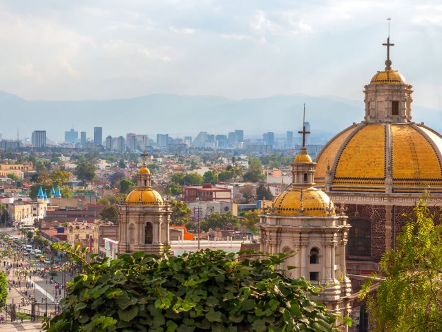 Gold-domed rooftops of church overlooking Mexico City