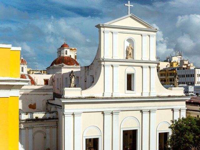 Image of the Cathedral of San Juan Bautista in Puerto Rico with San Juan in background
