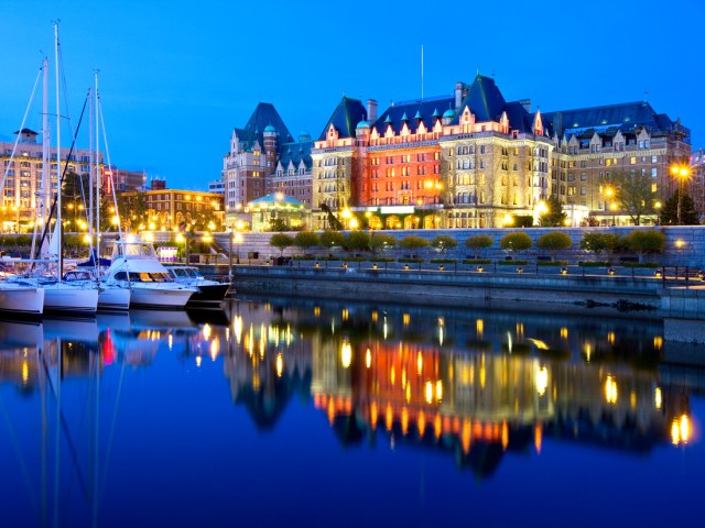 Victoria's Fairmont Empress Hotel overlooking the Inner Harbour at night