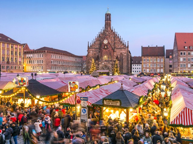 Stalls crowded with shoppers at Christkindlesmarkt in Nuremberg, Germany